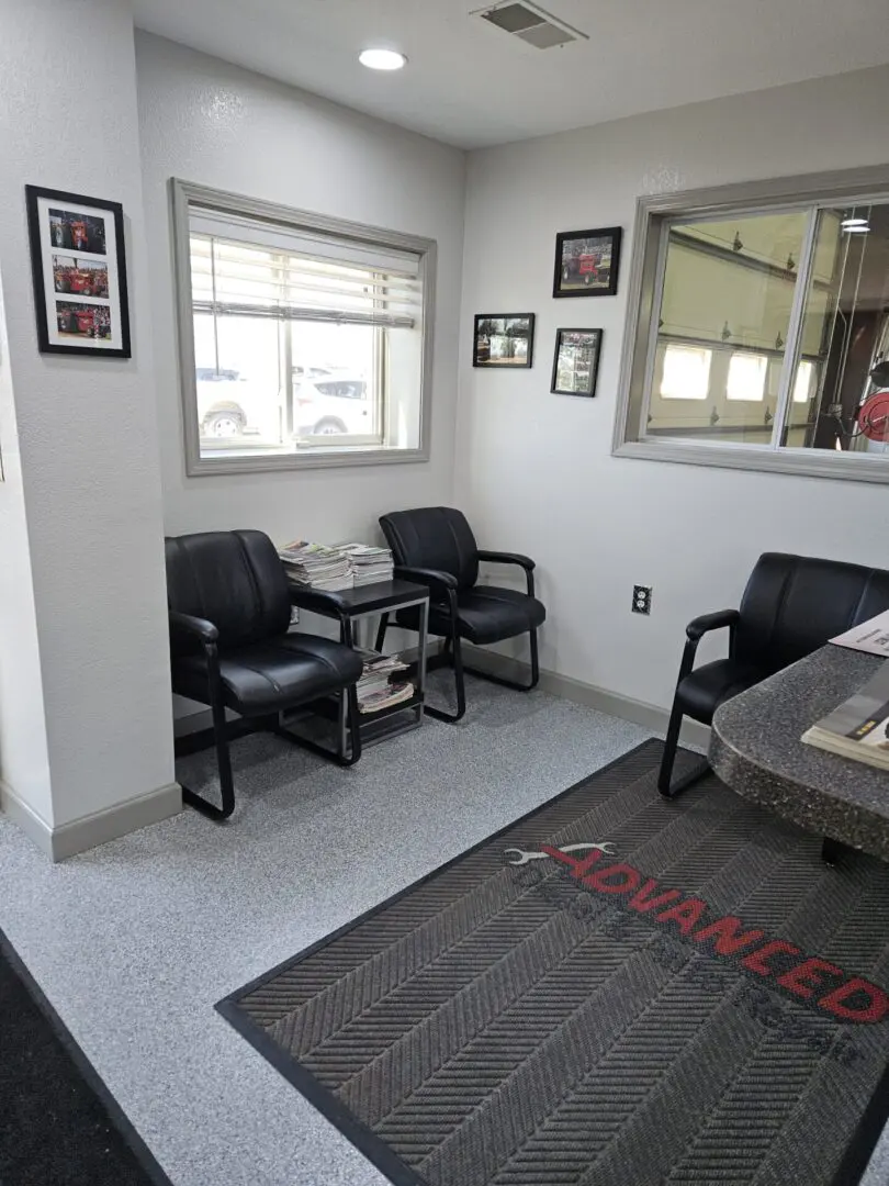 Waiting room with chairs and wall art