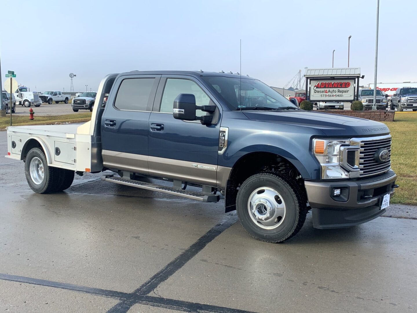 A truck is parked in the parking lot.