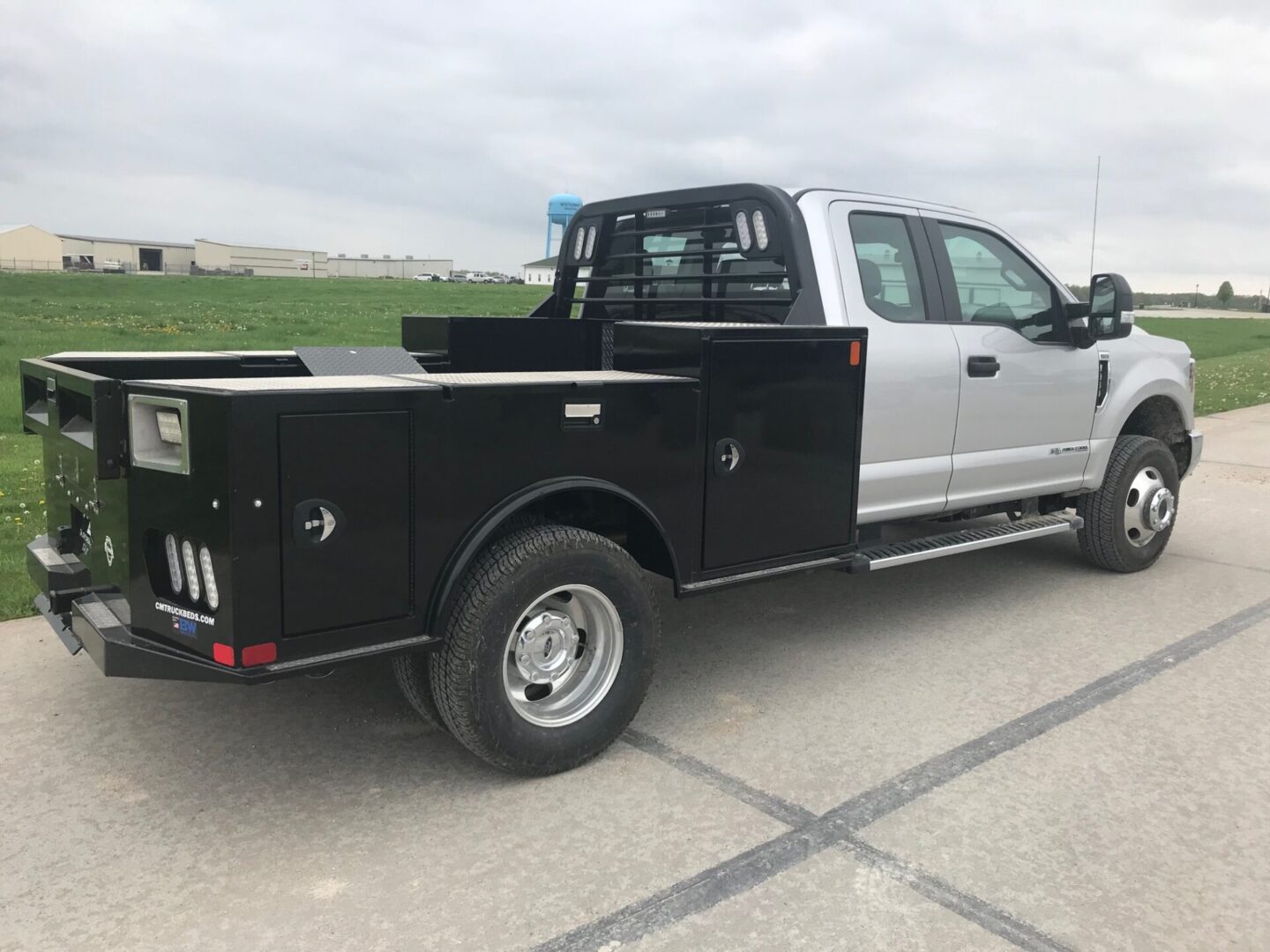 A truck with a flat bed on the back